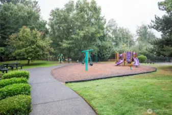 The community park is just a short walk from this home, and provides enjoyment for all ages with sports court, children's play equipment, adult exercise equipment, picnic and seating areas and even a neighborhood library book box.