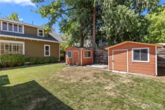 2 sheds in fenced backyard