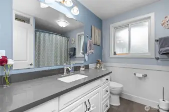 Updated bathroom with high end finishes and radiant heated tile flooring