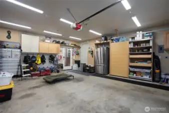 Garage with plenty of storage and brand new garage door