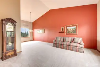 Vaulted Ceilings enhance the spacious living and dining rooms.