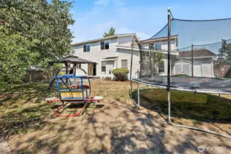 Trampoline and play set ready to enjoy and stay with the sale.