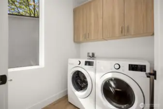 Laundry room adjacent to bedrooms