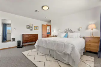 Retreat-style primary suite with private back patio, wired and ready for a hot tub—perfect for soaking in valley views and starlit skies.