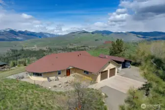Custom home set among aspens and pines for year-round beauty.