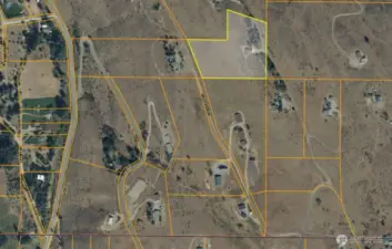 Expansive 6-acre property outlined—offering privacy, natural surroundings, and room to create your Methow Valley retreat.  Located minutes from Winthrop’s groomed Nordic ski trails and skate rink.