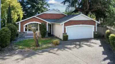 Wonderful Northwest Rambler on a fully fenced lot with gate.