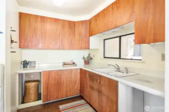 The small but functional kitchen could be refreshed or gut this space and rework the whole space.