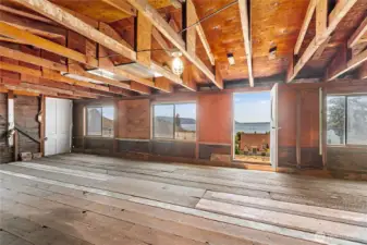 In the attic you have many options; leave as-is, lower the floor and increase the space here to finish it into additional living space.