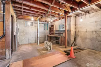 Workspace in the back, and on the left you can see a doorway which leads to what used to be a dark room.