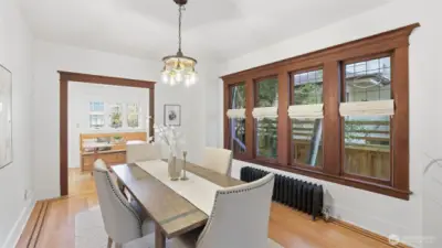 Formal dining space with original light fixture