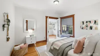 3 of 4 upstairs bedrooms. The bedrooms on the backside of the home share access to a flex space that runs the entire length of the home.