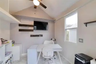 Interior of the finished outbuilding located in the backyard (Virtually Staged)