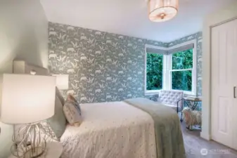 NW bedroom with windows to the backyard