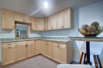 Downstairs work space with loads of storage for an office or craft space?