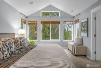 Primary bedroom with en-suite bathroom and walk-in closet.