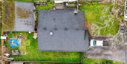 Aerial view of property with detached 2 car garage/shop. Zoned UR2