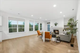 Great room, laminate floors, high ceilings, natural light