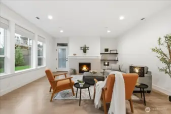 Great room, laminate floors, high ceilings, swing door to covered patio