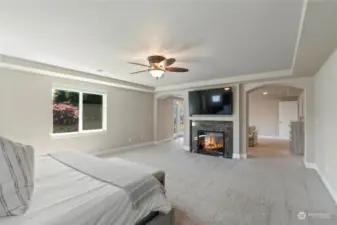 Beautiful highlight of the home is the vast Primary Suite. Tons of space, double sided fireplace, flex space/sitting area (possible nursery area), Juliet balcony overlooking the backyard and attached 5-piece bathroom with walk-in closet.