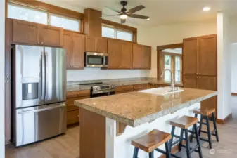 Kitchen island, pass through window to dining room