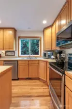 Hardwood floors throughout kitchen area