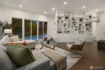 The walk-out basement includes a large media room with access to the private patio, additional two bedrooms, and two bathrooms.