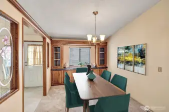 Formal dining room has built in hutch for all your dinnerware and accessoires. Room for a 6 -8 setting table plus additional furniture.