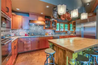 Sub Zero refrigerator freezer and Thermador oven and cooktop