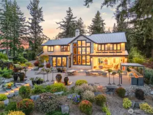 Custom landscaping with lighting – four waterfall urns- two outdoor fire-pits