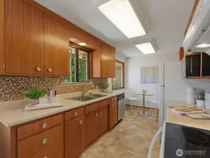 Genuine mid-century style wood kitchen cabinets.