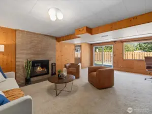 Fabulous family room with wood fireplace.