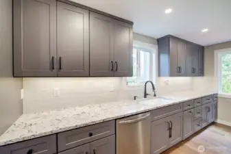 Plenty of cabinet and counter space here. The under the counter lighting is a great feature.