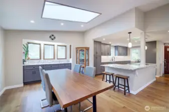 Counter and cabinets in the dining room would make a great coffee bar or serving area for dinners.