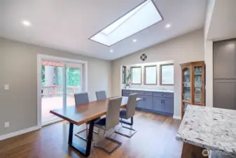 The slider off the dining room leads out onto a spacious deck that over looks the yard.