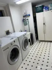 Utility room downstairs. Refrigerator/freezer to go with seller.