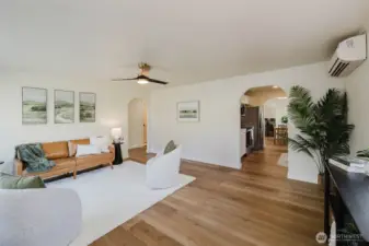 Large, open living space, arched doorways, new LVP throughout