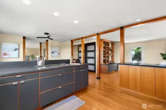 Kitchen with Thermador stove and Sub Zero fridge.  The looks towards the spacious pantry and great room.