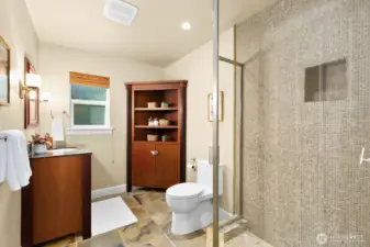 Guest bathroom on main floor complete with shower.