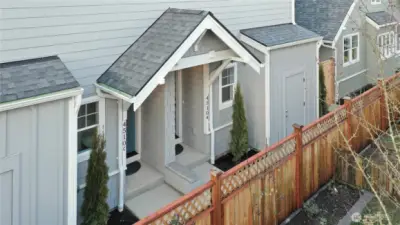 Covered entryway and exterior bike storage & utility closet.