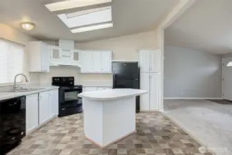 Kitchen (appliance included), looking towards family room and front entrance.