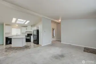 Family room & kitchen, looking towards hallway, 2nd & 3rd bedroom and guest bathroom.