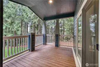 This front porch allows time to unwind and enjoy the peek-a-boo mountain views