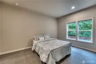 TO the right is a large walk in closet