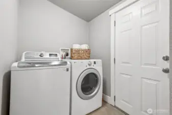 Laundry is located off of the kitchen in a separate room with back door access to the back deck and yard. A new hot water tank installed in 2025 provides efficiency and reliability. This major update offers peace of mind for years to come. It’s one less thing to worry about after move-in.