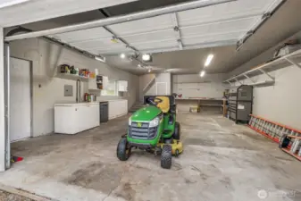 The riding lawnmower has low hours and remains with the home as a convenience to seller.