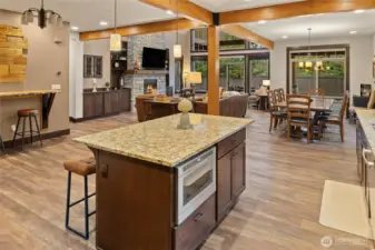 Kitchen view of dining and great room