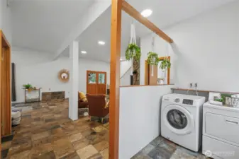 Laudrey area located just off the fully fenced back yard area and hot tub area.