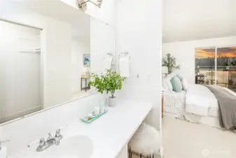 Even here, the view remains—present as you begin and end the day at the ensuite vanity