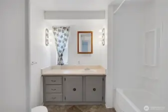 The hall has a spacious full bathroom...